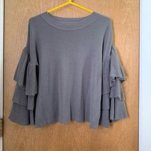 grey sweater with ruffled bell sleeves